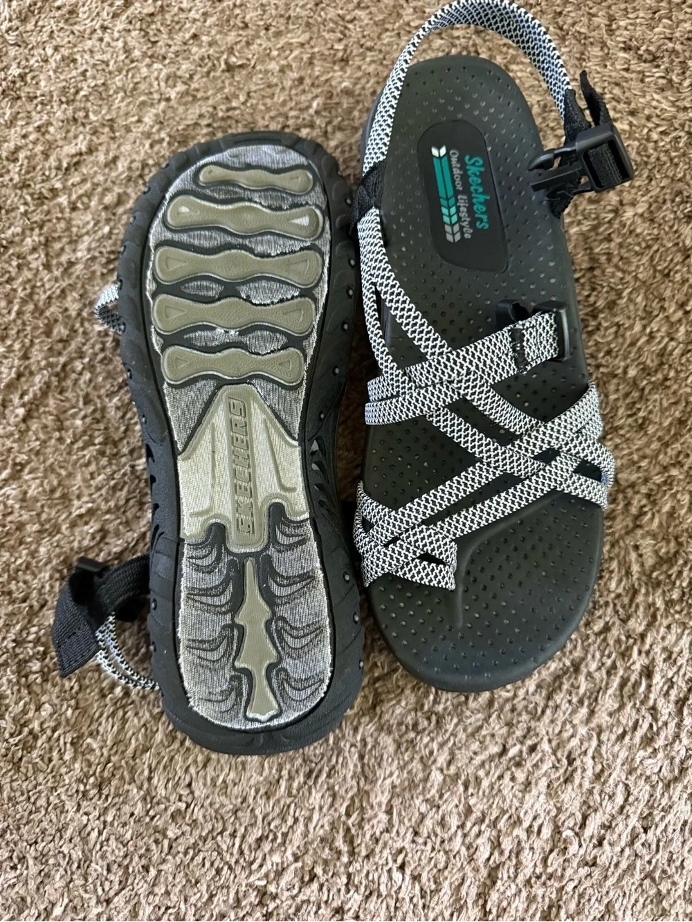 Skechers woman’s Black and White Strappy Sandals